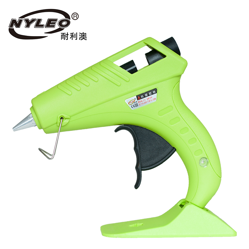 Hot melt glue gun with base