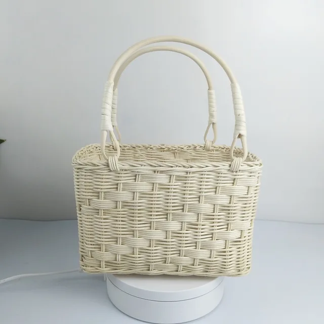 White vines weave baskets of flowers