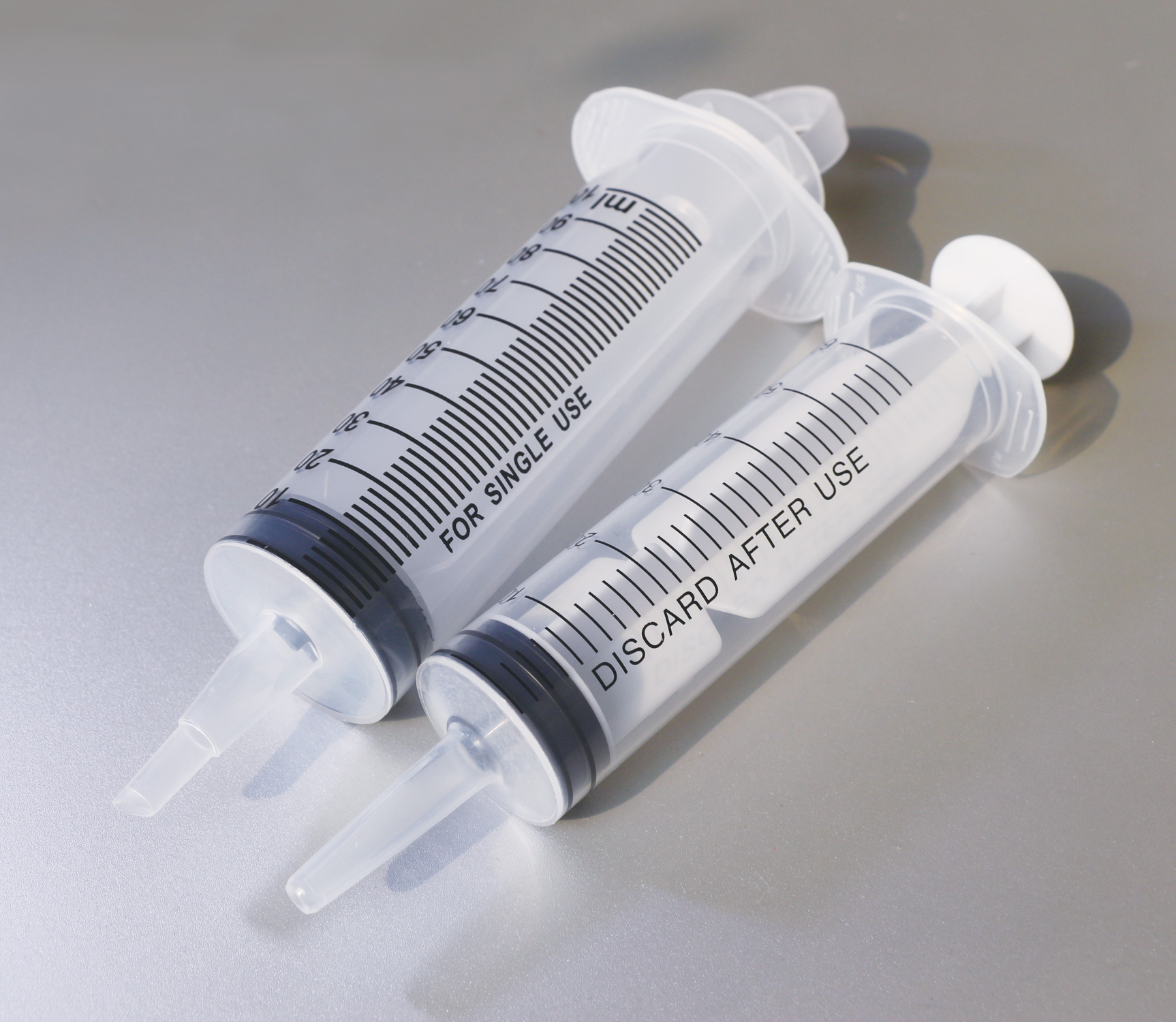 Disposable syringe with catheter tip