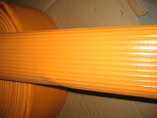Yellow Rubber covered fire hose
