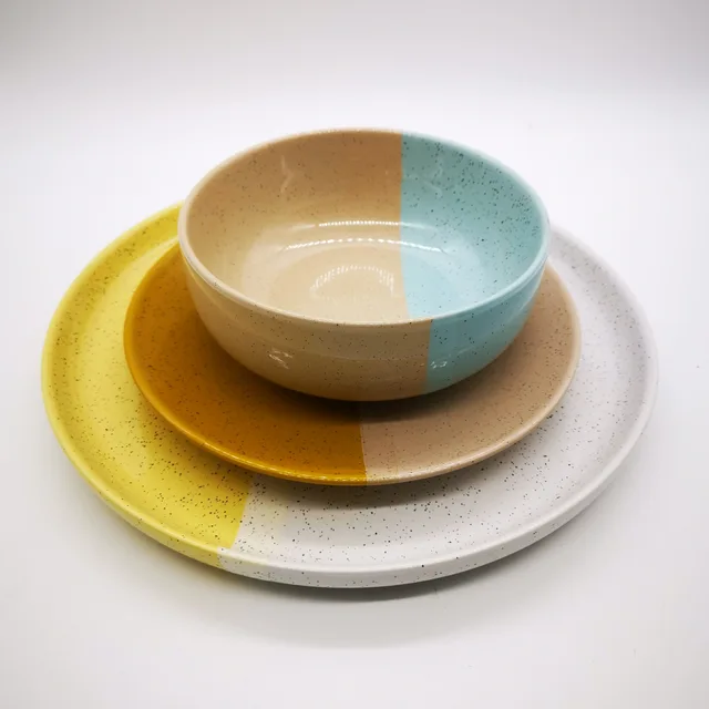 Stoneware dipped glaze with speckle effectss dinnerware set