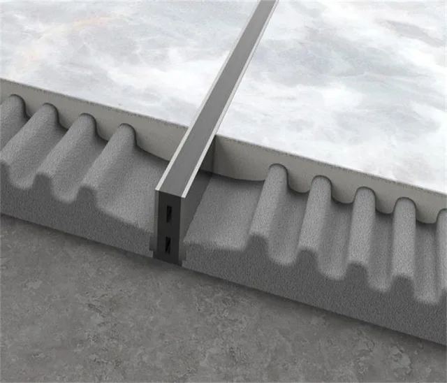 Expansion joint with removable inserts