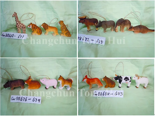 Wood carved animal holiday ornament