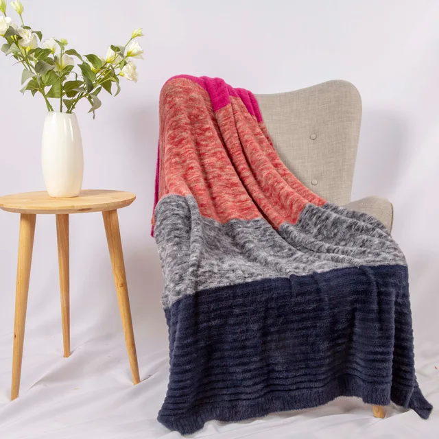 Faux fur knitting throw