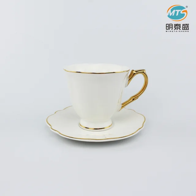 Ceramic cup&saucer with full gold handle
