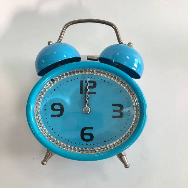Colorful oval-shaped twin bell alarm clock