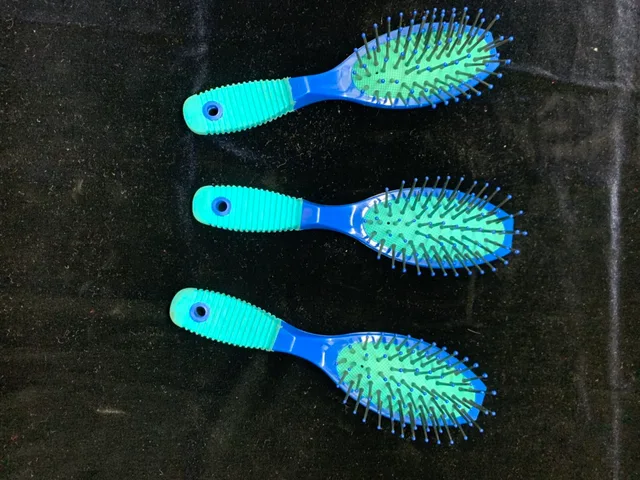 Injection paddle hair brush