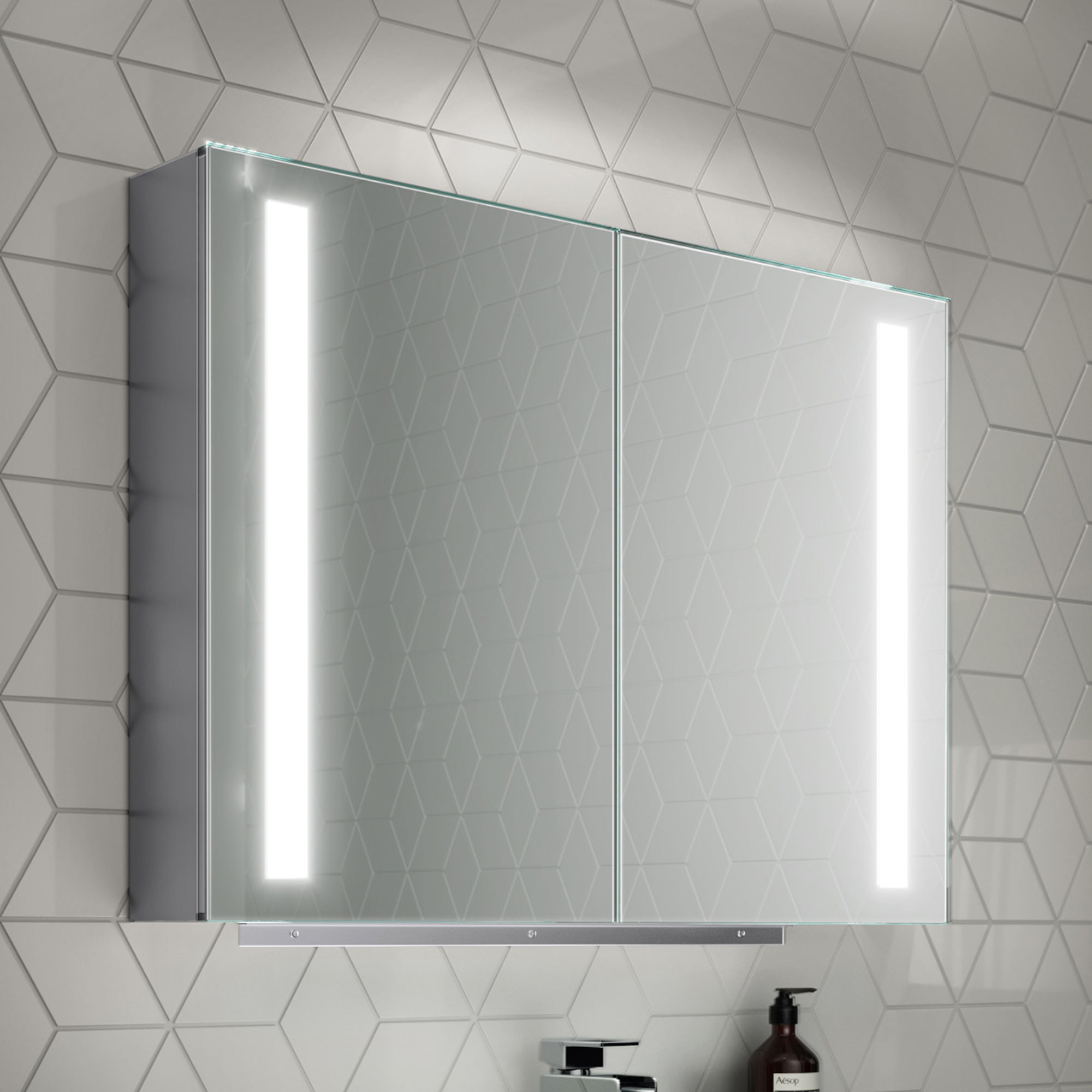 Illuminated mirror cabinet