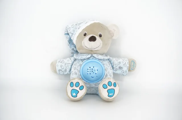 Plush bear with music and light