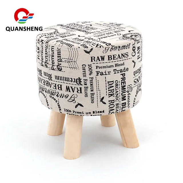 Ottoman with wooden legs