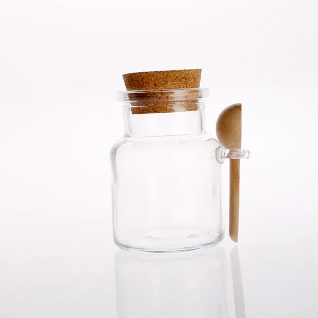 Glass canister with cork lid and bamboo spoon