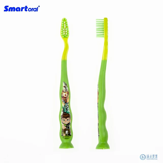 Junior toothbrush with suction cap and printed handle