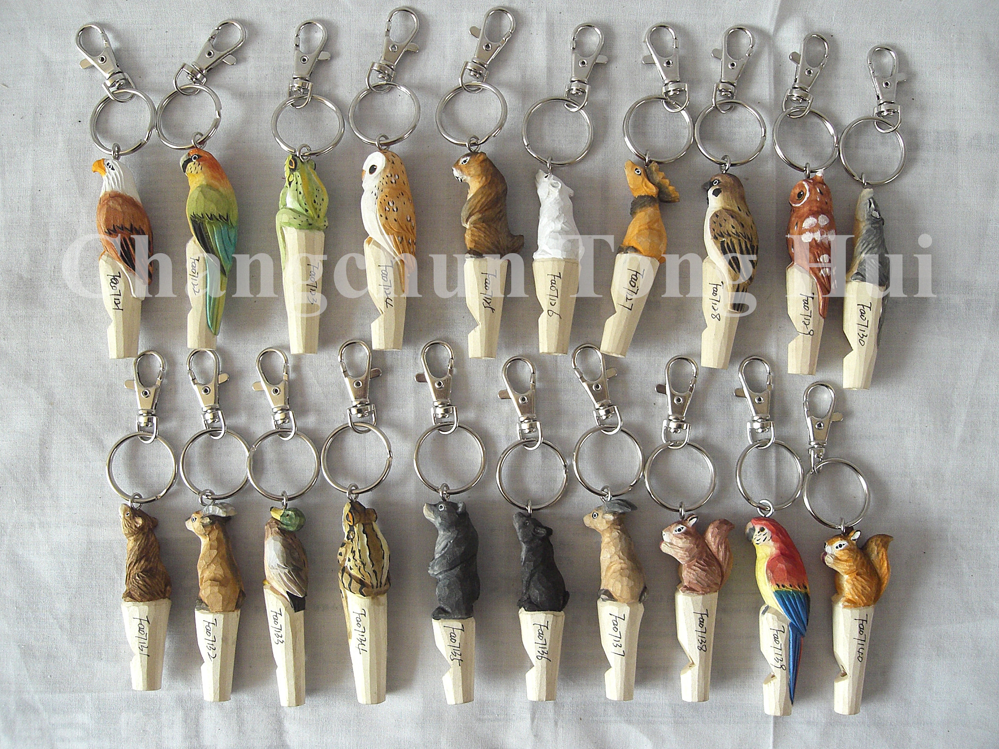 Wood carved animal keychain with whistle