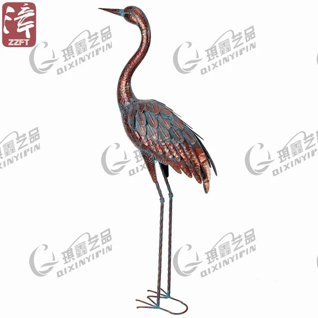 Metal big bronzed heron statue