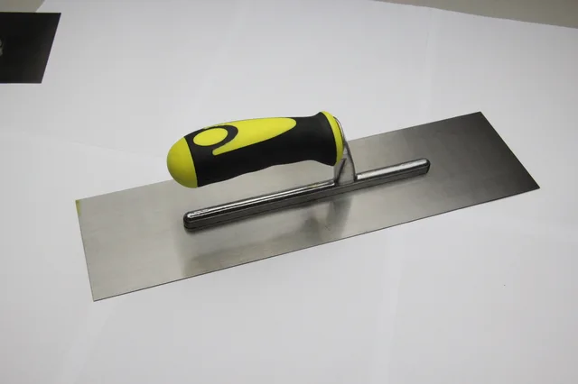 American Trowel In Carbon Steel,curved Blade, Rubber Handle