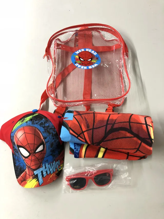 The beach set of beach towel, beach cap and sunglasses