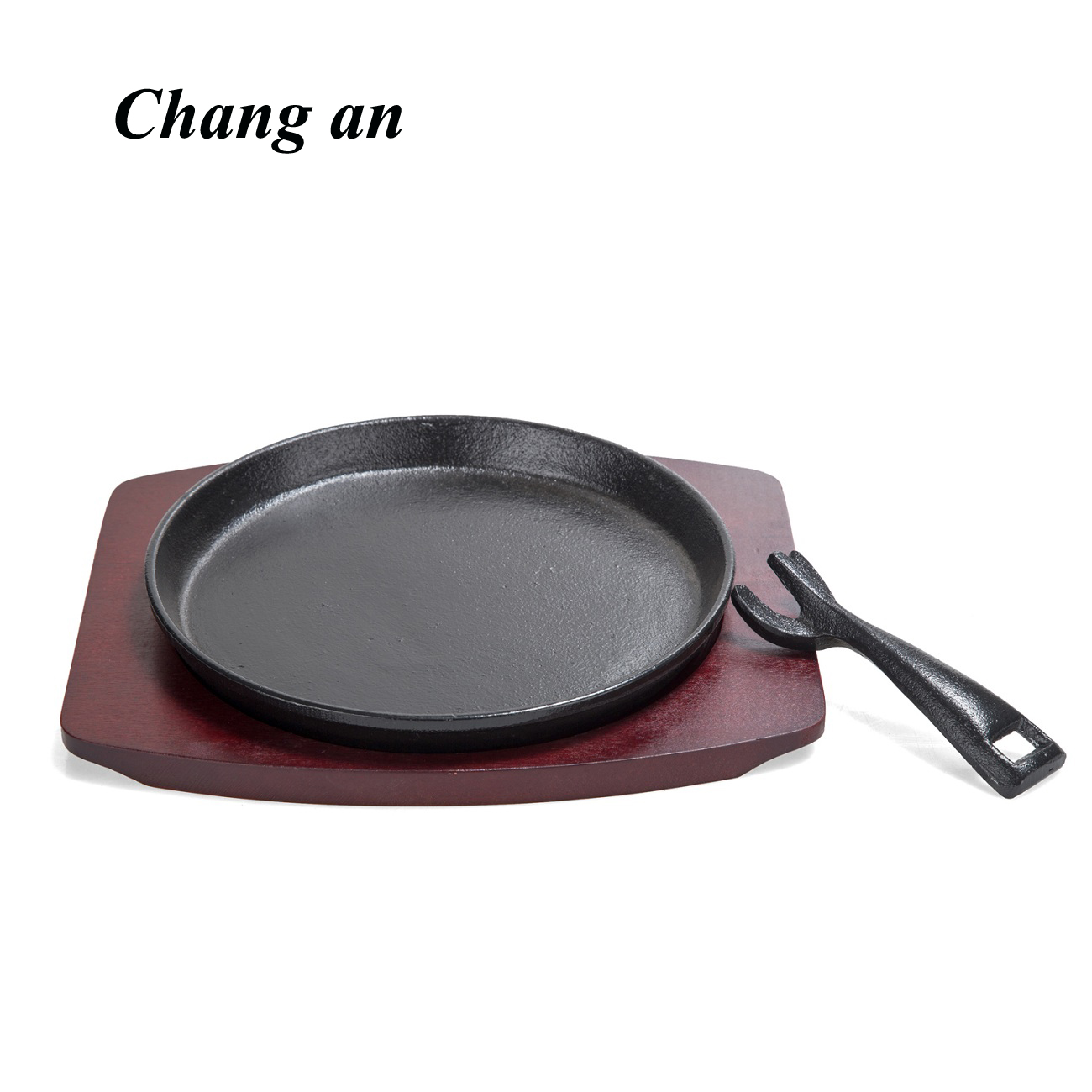 Cast iron round steak platter with wooden tray