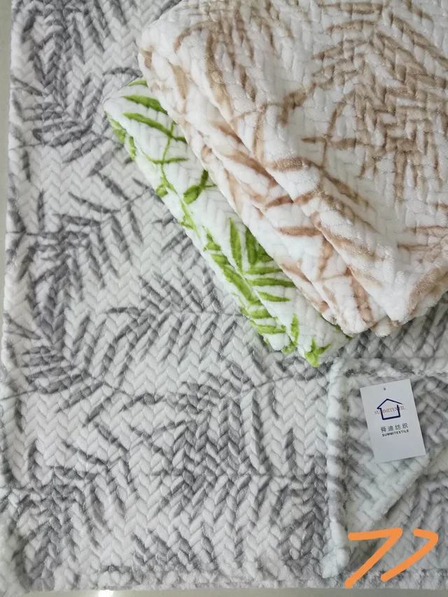Jacquard and printed flannel blanket