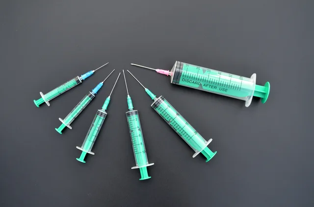 Disposable syringe with needle