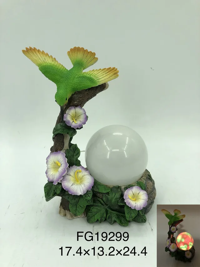 Solar polyresin bird with ball