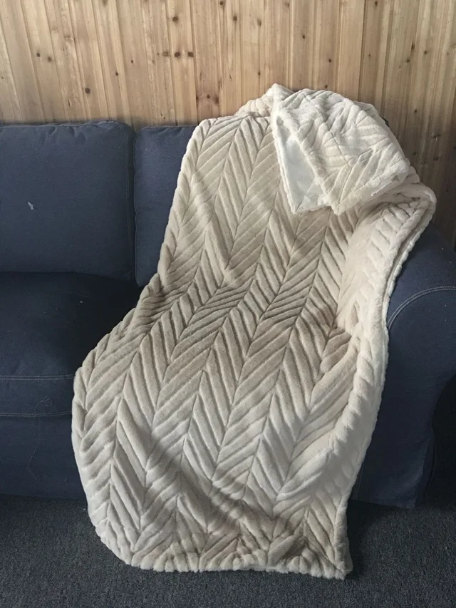 Embossed rabbit fur blanket