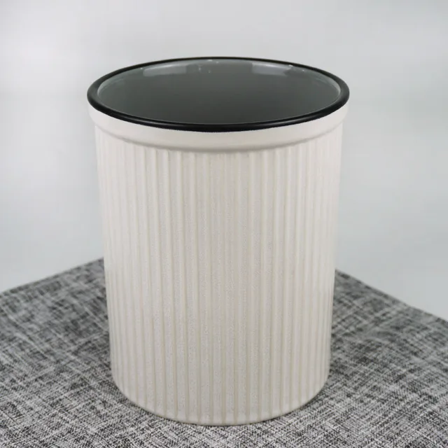Emboss utensil holder