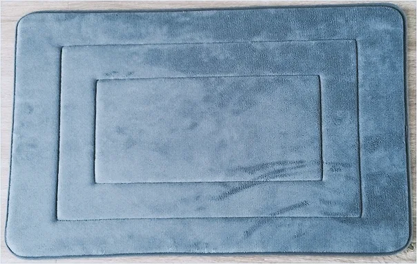 Embossed bath mat