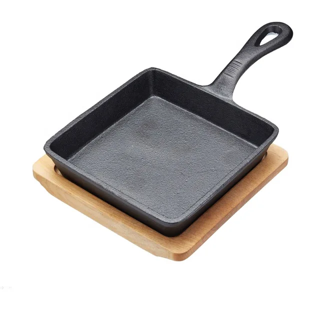 Cast iron frypan with wooden base