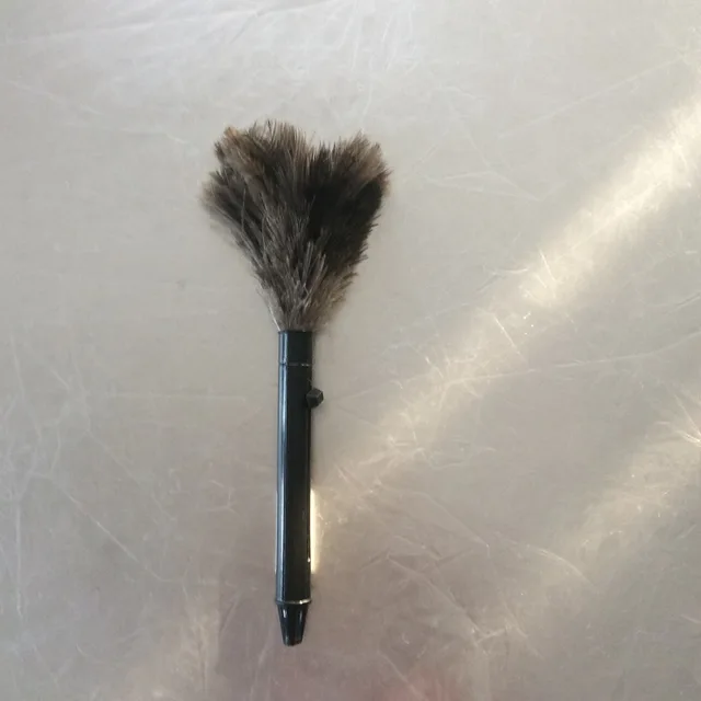 Ostrich feather duster with retractable pp handle