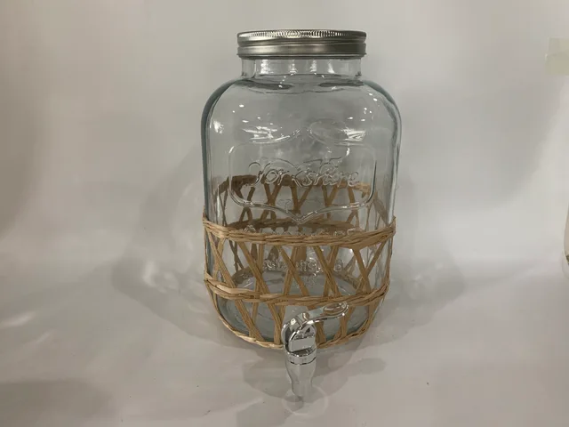 Glass dispenser with cattail wrapped
