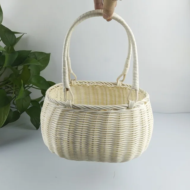 White vines weave baskets of flowers