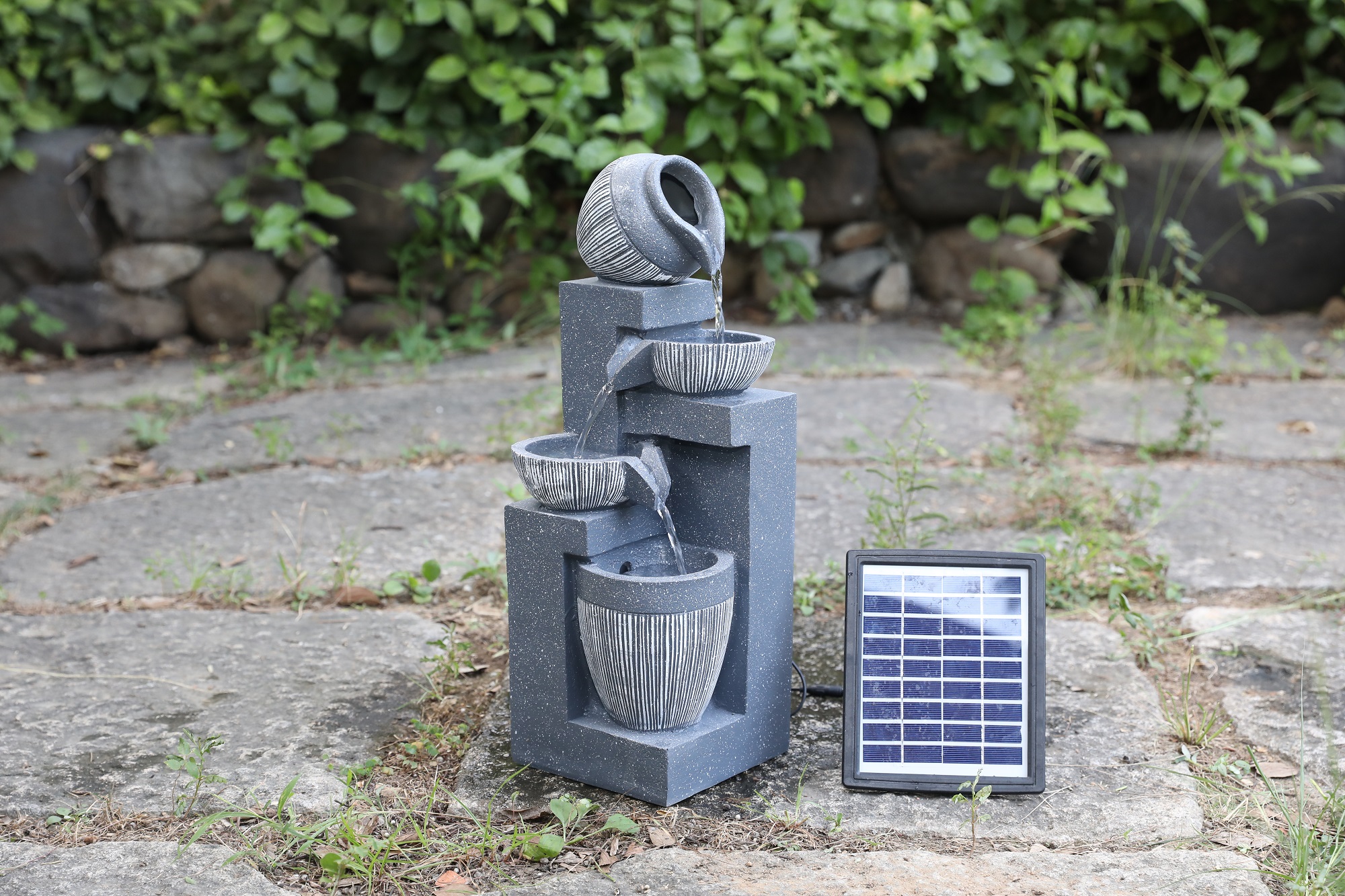 Hotselling line stone feeling solar water fountain