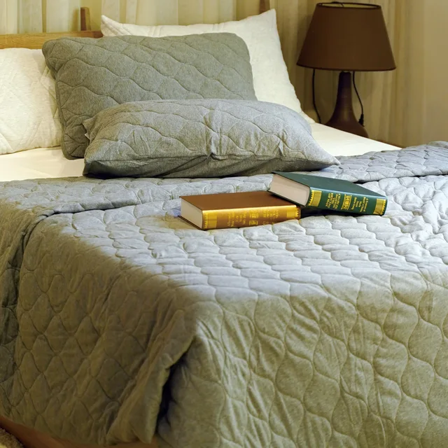 Quilted knit coverlet