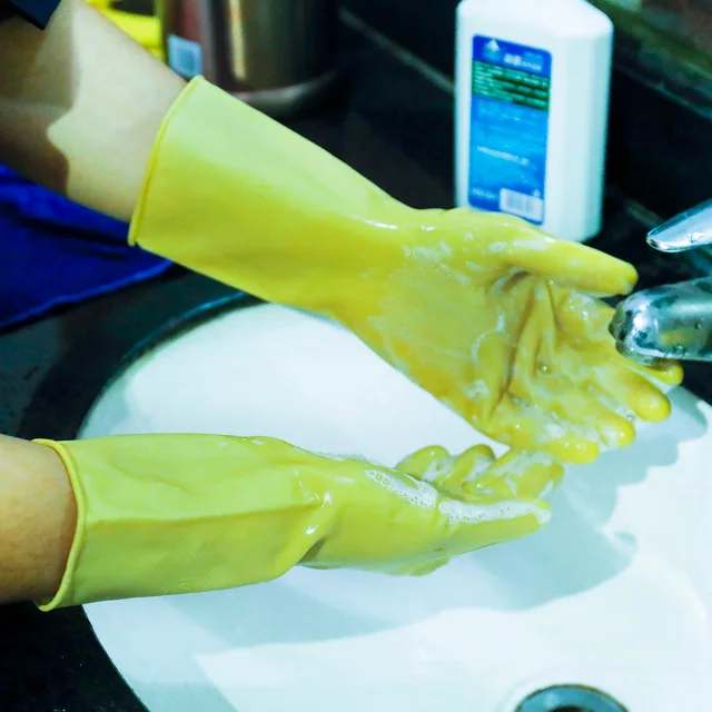 Yellow latex household gloves. water proof,anti slip,flexible