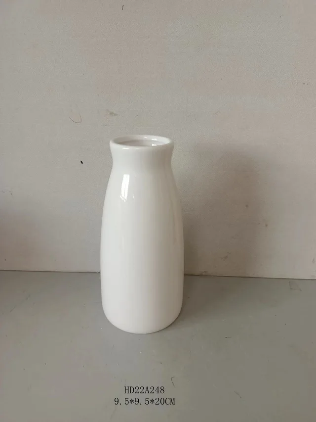 Set of three simple shinning white ceramic vase