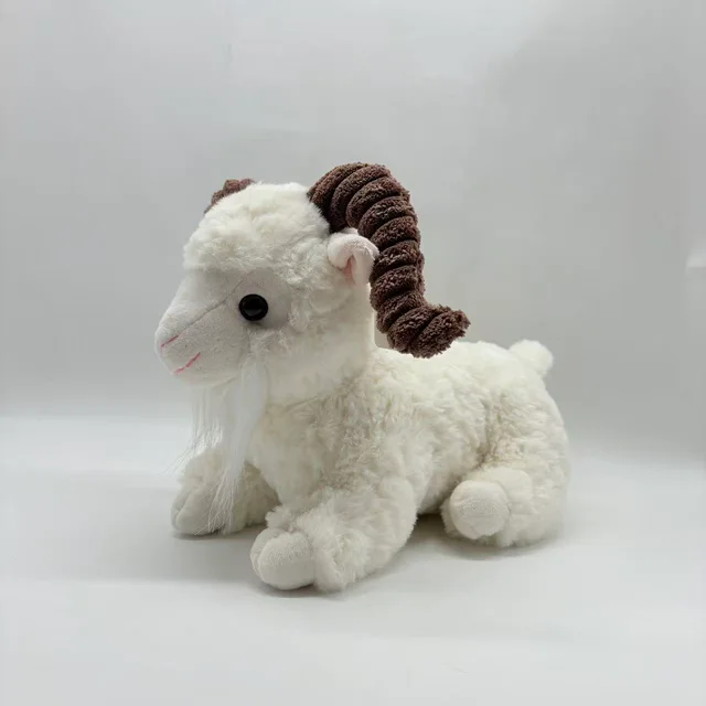 Plush toy, lying goat, black and white